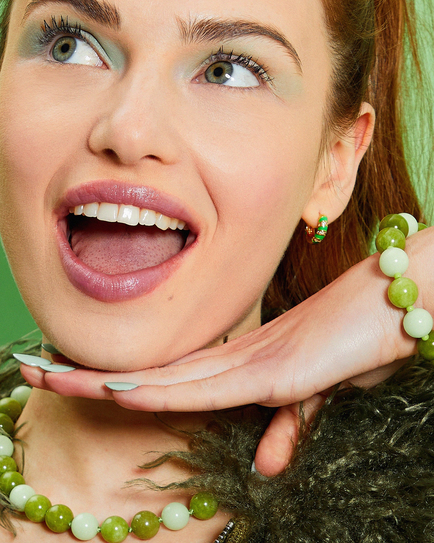 Neon Green Twisted Cubic Zirconia Huggie Hoop Earrings